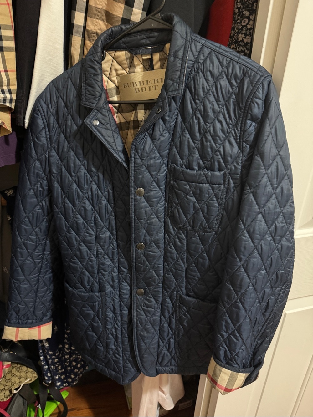Burberry Quilted Navy Puffer Jacket with Signature Check Trim